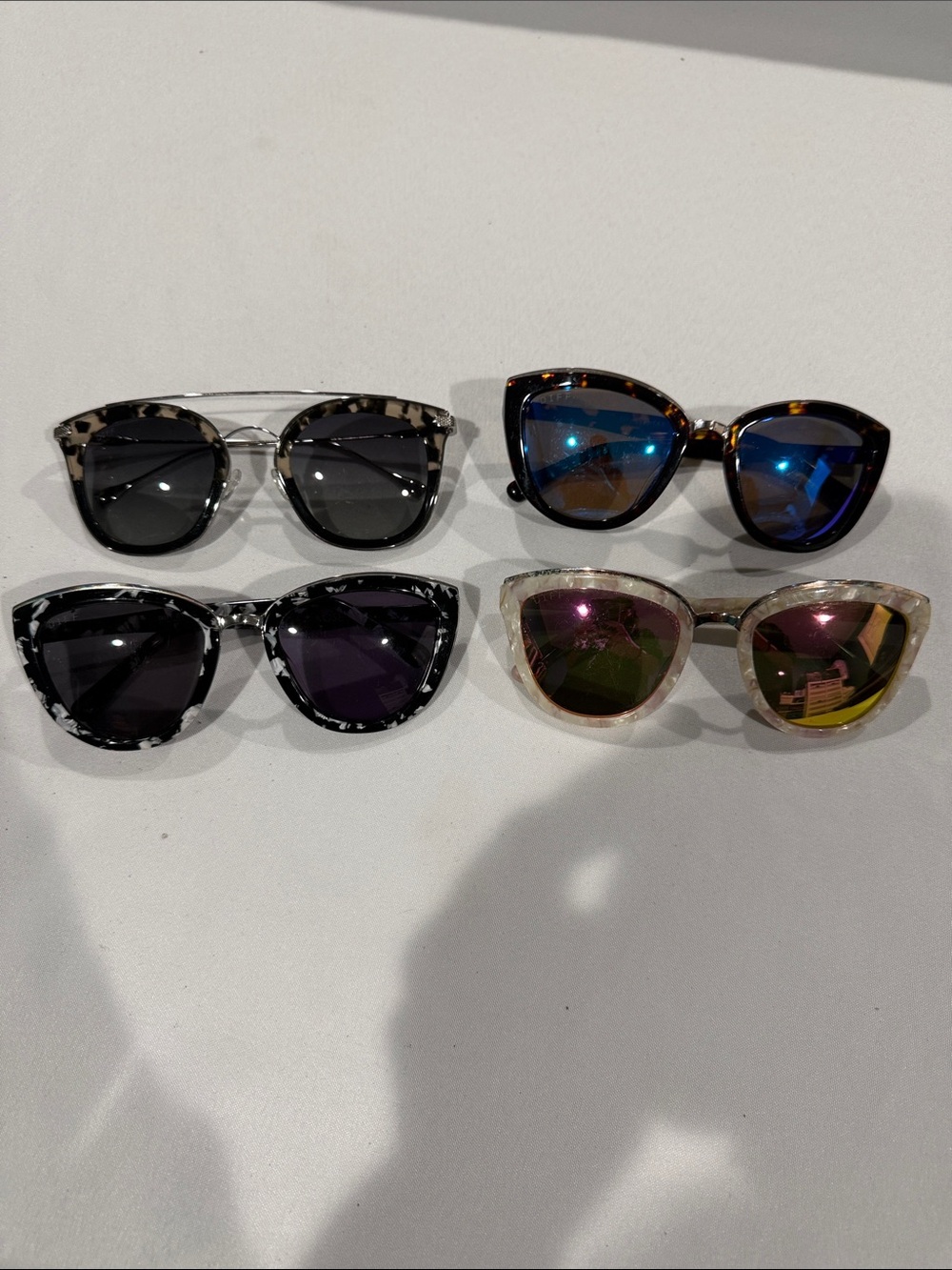 Four pairs of DIFF sunglasses